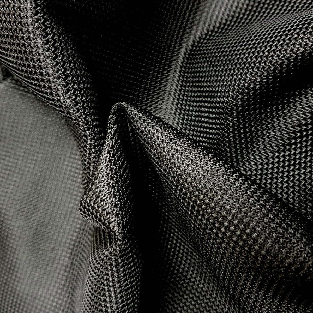 Close-up of black Made-to-order mesh material, ideal for custom sight screen frames and structures.