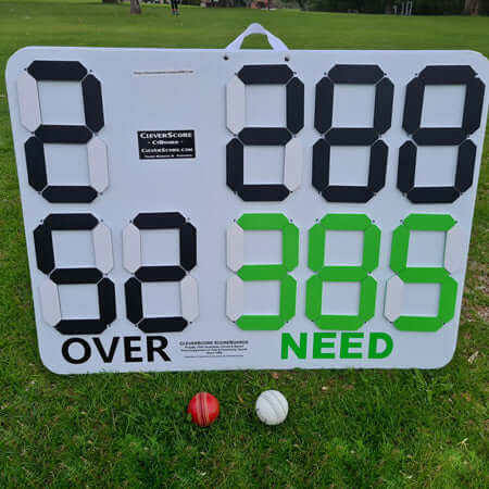CleverScore CyBoard Manual Cricket Scoreboard displaying scores and overs in a cricket match setting.