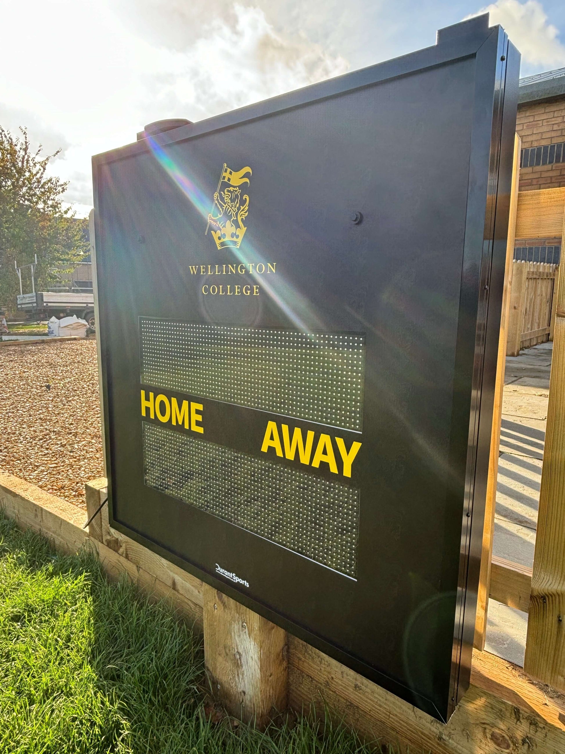Multi-Sport Scoreboard featuring HOME and AWAY displays at Wellington College with bright digits.